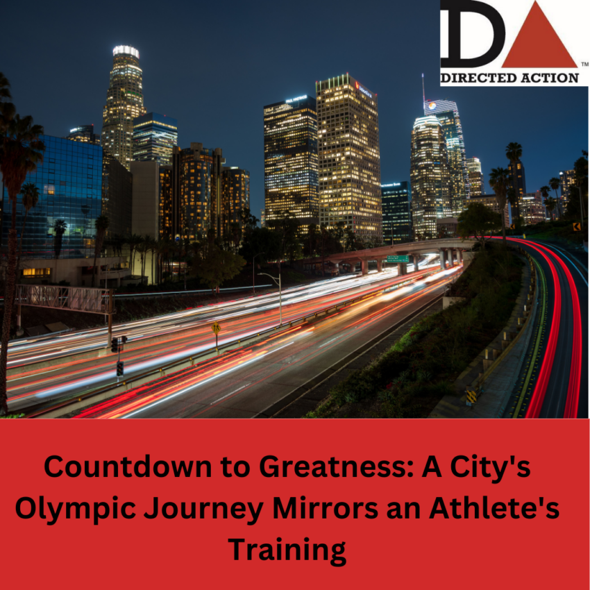 A city at night with the words Countdown to Greatness: A city's olympic journey mirrors an athlete's preparation