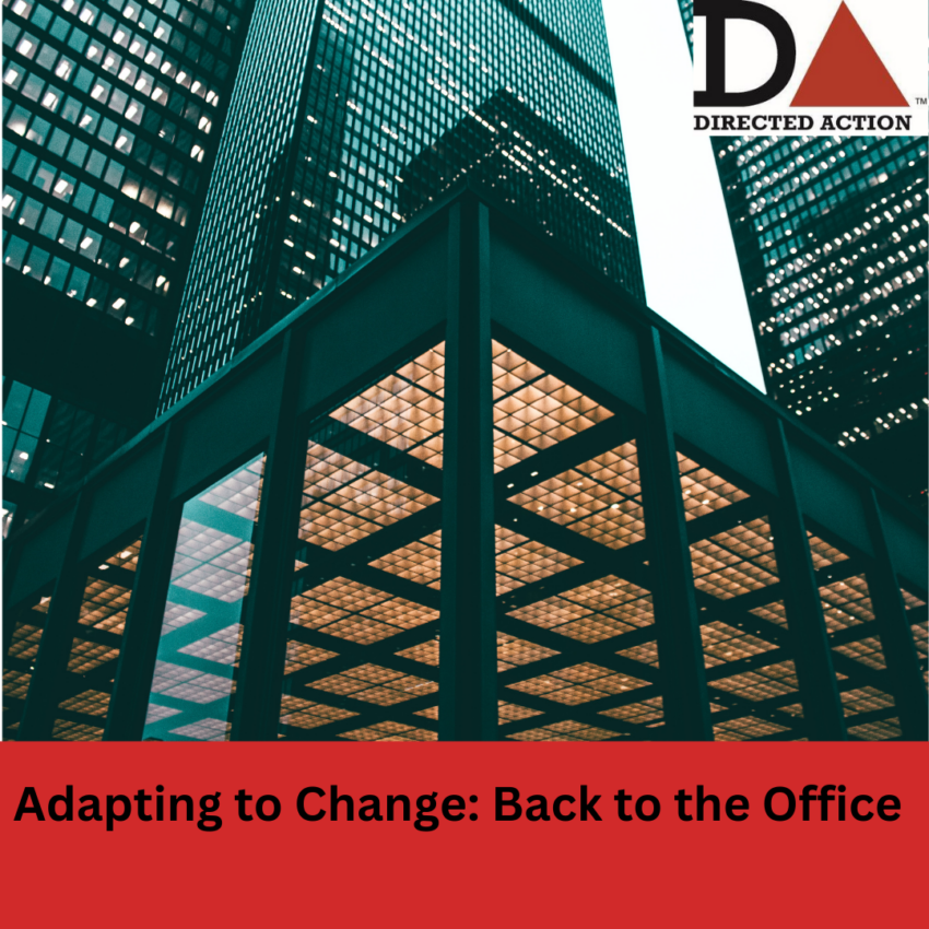 An office building of black steel and glass with the banner Adapting to Change: Back to the Office beneath the photo